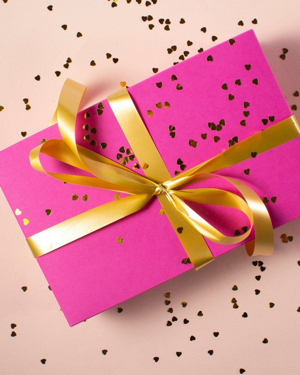 A wrapped gift box, unopened