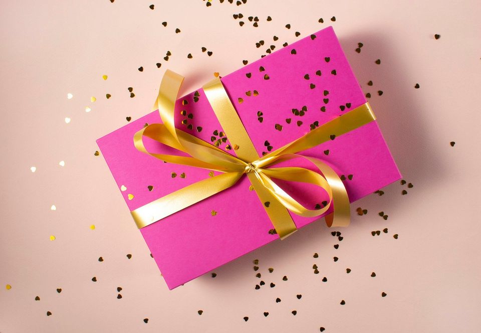 A wrapped gift box, unopened